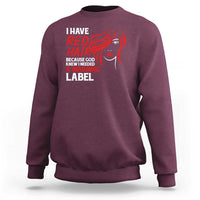 Maroon crewneck sweatshirt with front red hair warning label graphic