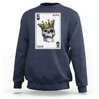 Navy blue sweatshirt with front king card and gold crown skull graphic
