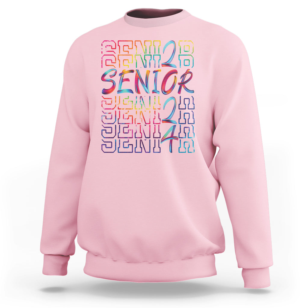 Light pink crewneck sweatshirt with colorful 'Senior 2024' graduation text graphic