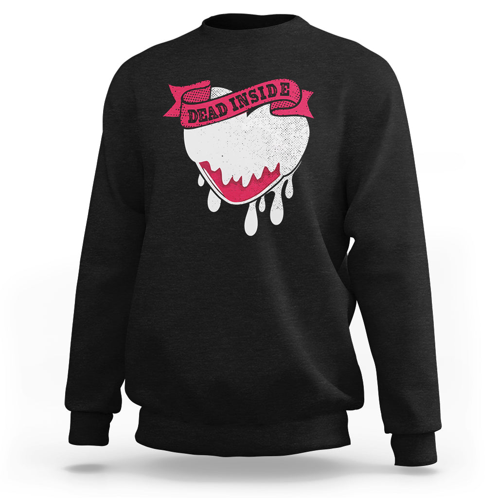 Black crewneck sweatshirt with “Dead Inside” melting heart graphic