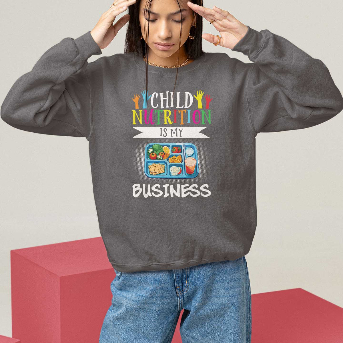 Kids sweatshirt, charcoal gray, crew neck, "Child Nutrition Is My Business" front graphic.