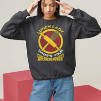 Dark gray sweatshirt with “Lunch Lady” graphic and “What’s Your Superhero Power” text