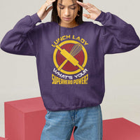 Purple sweatshirt with “Lunch Lady” graphic and “What’s Your Superhero Power” text