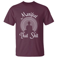 Maroon T-shirt with white “Manifest” and “That Shit” graphic and Buddha mandala