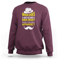 Men's maroon crewneck sweatshirt with dad-joke quote graphic and mustache
