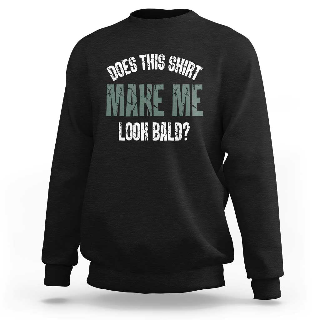Black crewneck sweatshirt with “Does this shirt make me look bald?” graphic