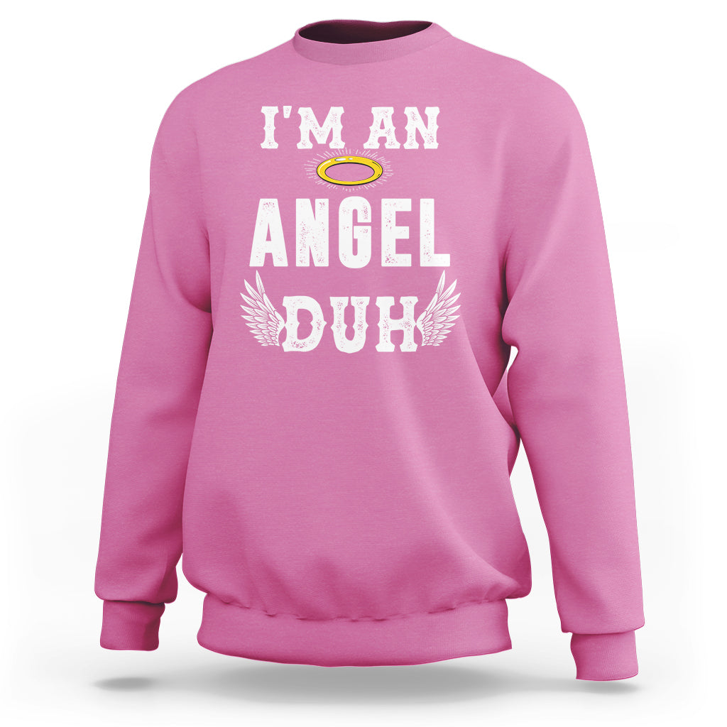 Azalea crewneck Christmas sweatshirt with chest graphic reading "I'm an Angel Duh".