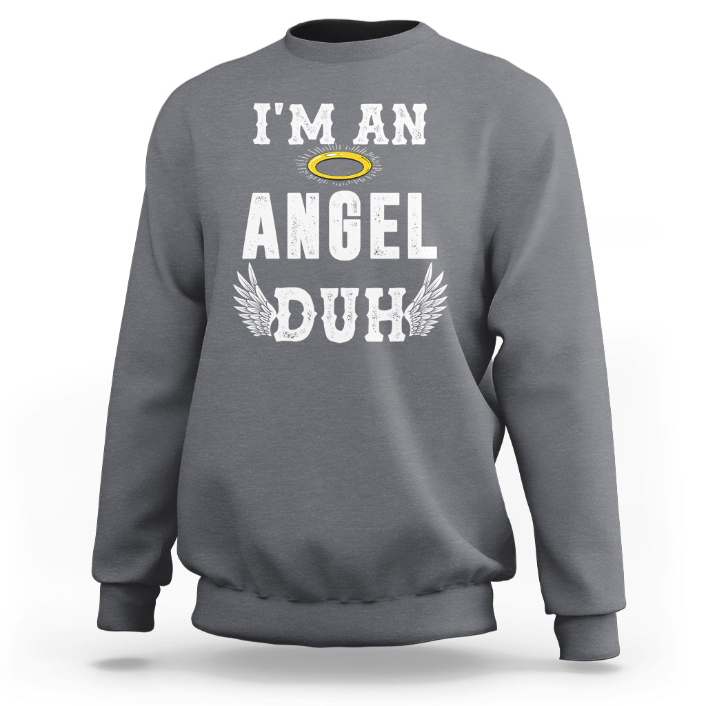 Charcoal gray crewneck Christmas sweatshirt with chest graphic reading "I'm an Angel Duh".