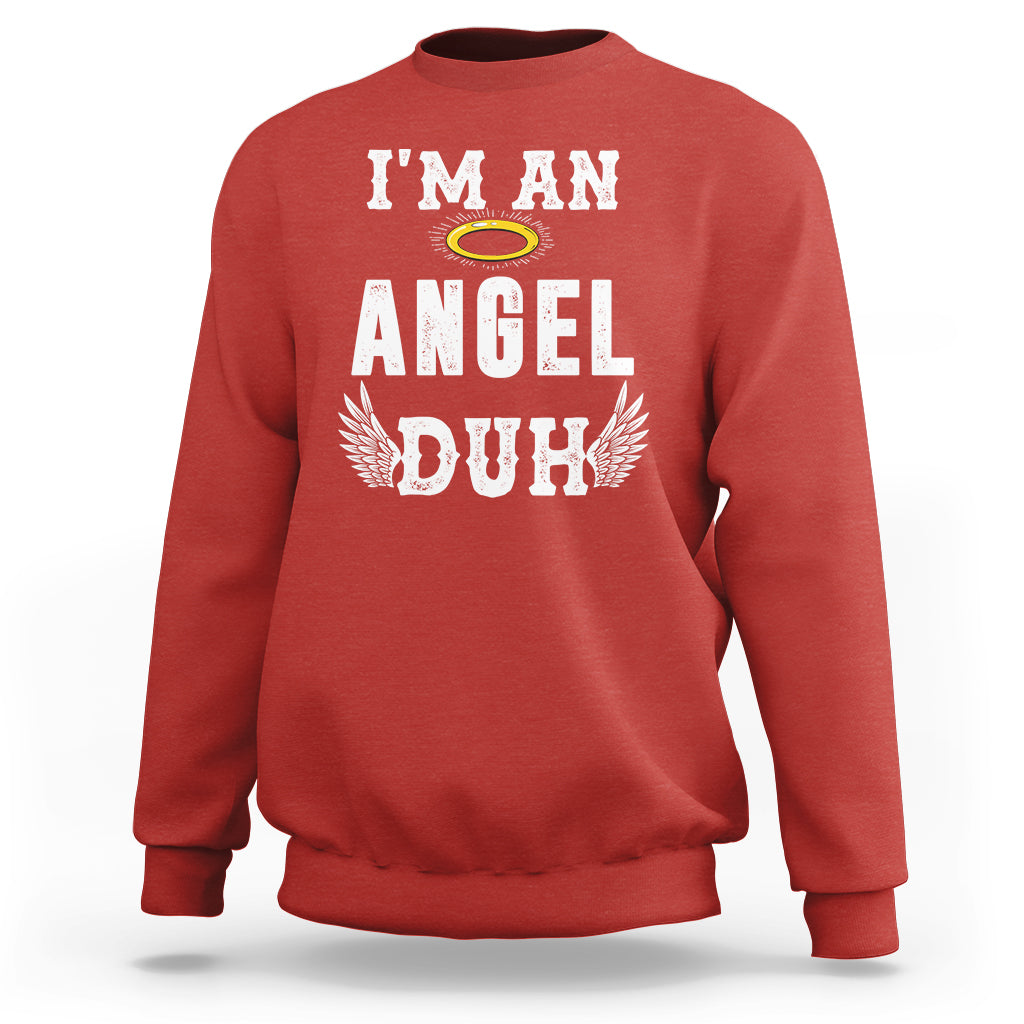 Red crewneck Christmas sweatshirt with chest graphic reading "I'm an Angel Duh".