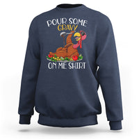 Navy crewneck sweatshirt with turkey graphic and “POUR SOME GRAVY ON ME SHIRT” on back