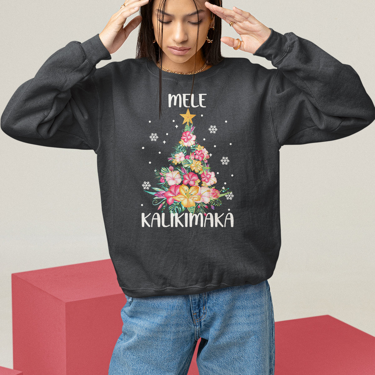 Black tropical Christmas sweatshirt with Mele Kalikimaka tree floral graphic on front