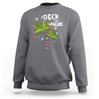 Men's charcoal gray sweatshirt with colorful "Deck the Palms" palm tree graphic.