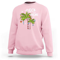 Men's light pink sweatshirt with colorful "Deck the Palms" palm tree graphic.