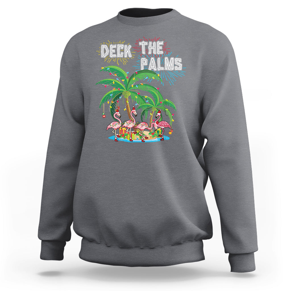 Charcoal gray Christmas sweatshirt with 'Deck the Palms' flamingo palm tree graphic