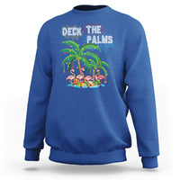Royal blue Christmas sweatshirt with 'Deck the Palms' flamingo palm tree graphic