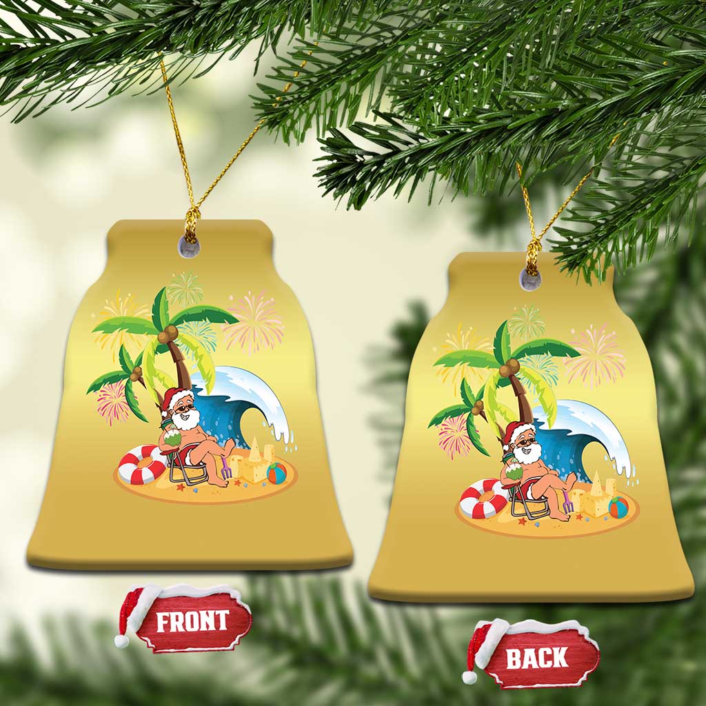 Gold bell-shaped ornament pair with Santa on beach under palms, front and back labels.