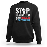 Black crewneck sweatshirt with bold front 'STOP' graphic and slogan