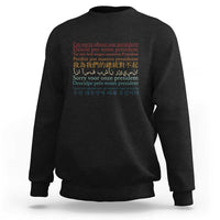 Black crewneck sweatshirt with front text graphic