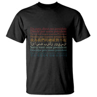 Black crew-neck T-shirt with centered multi-language apology text graphic