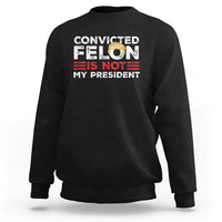 Black crewneck graphic sweatshirt with “CONVICTED FELIN IS NOT MY PRESIDENT” print