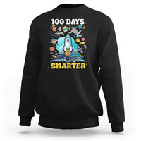Black crewneck sweatshirt with "100 DAYS" and "SMARTER" space rocket graphic