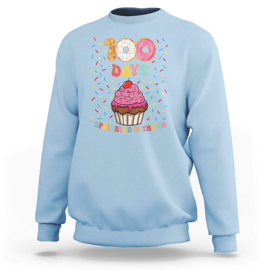 Light blue sweatshirt with 100 Days cupcake graphic, 'Sprinkled with Fun'