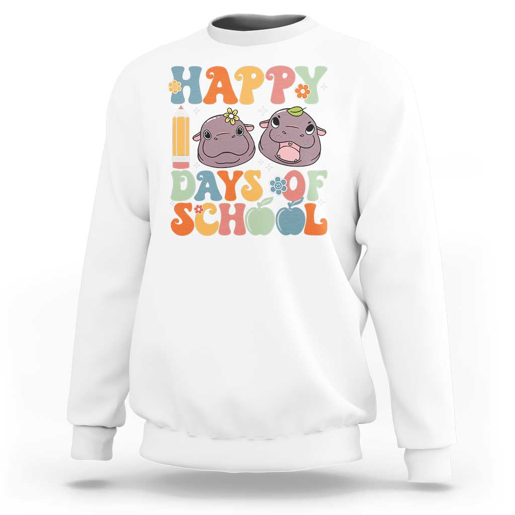 White sweatshirt with colorful "Happy Days of School" graphic and two cartoon cows