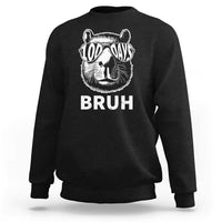 Black crewneck sweatshirt with capybara wearing sunglasses and 'BRUH' front print