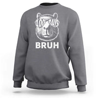 Charcoal gray crewneck sweatshirt with capybara wearing sunglasses and 'BRUH' front print