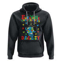 Black autism awareness hoodie with colorful puzzle-heart graphic and rainbow text.