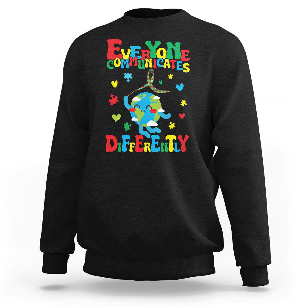 Black crewneck sweatshirt with colorful autism awareness text and puzzle graphic