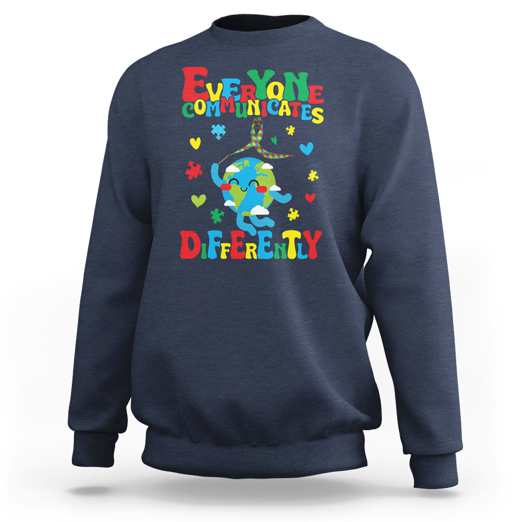 Navy crewneck sweatshirt with colorful autism awareness text and puzzle graphic