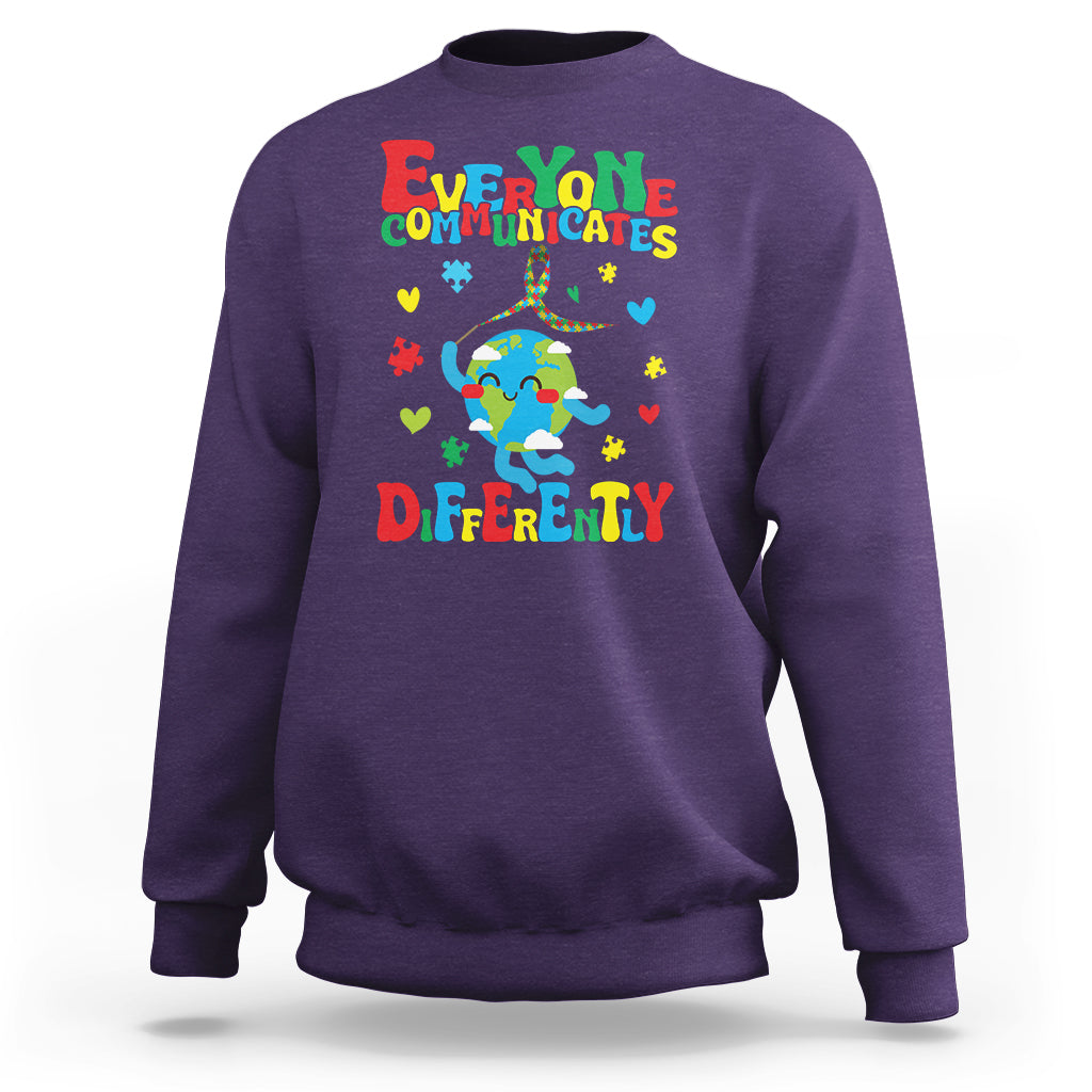 Purple crewneck sweatshirt with colorful autism awareness text and puzzle graphic