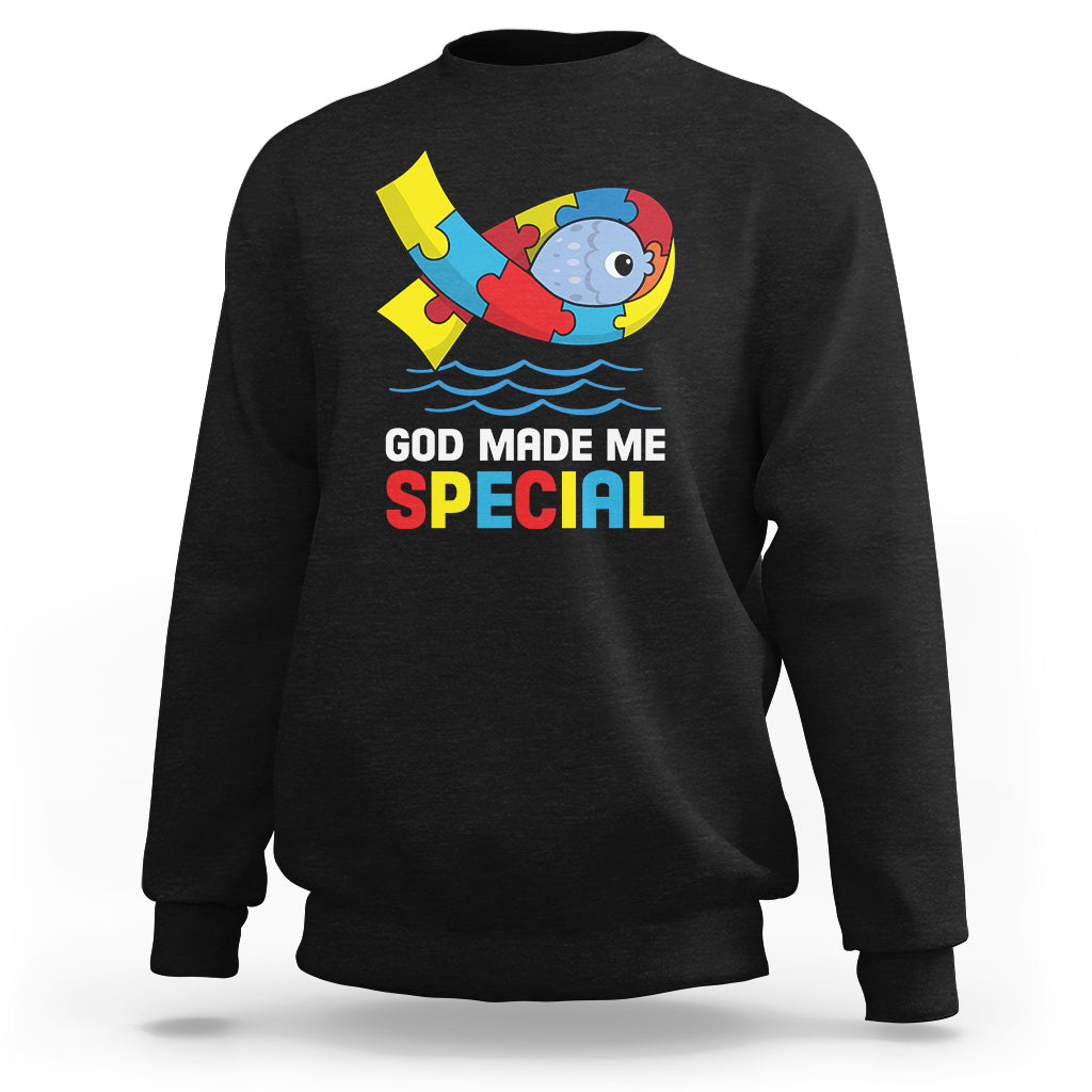 Black autism awareness sweatshirt with colorful puzzle fish graphic and “God made me special” text