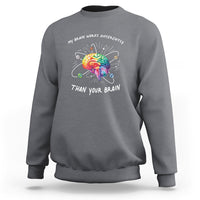 Charcoal gray autism awareness sweatshirt with colorful brain graphic and slogan on chest