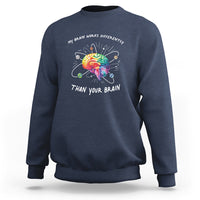 Navy autism awareness sweatshirt with colorful brain graphic and slogan on chest