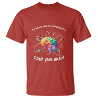 Red autism awareness T-shirt with colorful brain graphic and text 'My brain works differently'