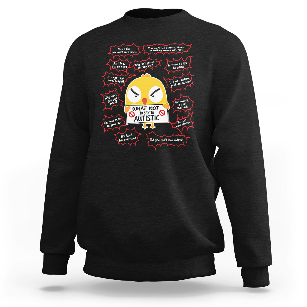 Black crewneck sweatshirt with chick graphic and autism awareness text in heart bubbles