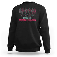 Black crewneck sweatshirt with colorful hand graphic and “I STIM FOR SENSORY REGULATION”.