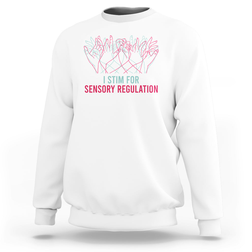 White crewneck sweatshirt with colorful hand graphic and “I STIM FOR SENSORY REGULATION”.