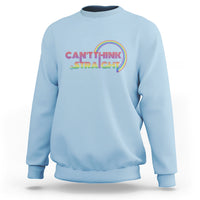 Light blue crewneck sweatshirt, rainbow 'CAN'T THINK STRAIGHT' logo on front.