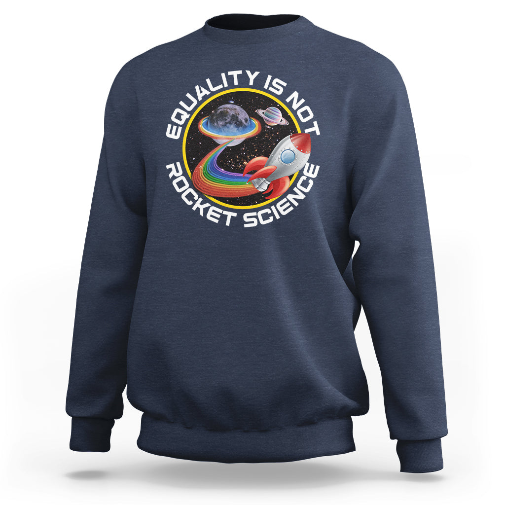 Navy crewneck sweatshirt with colorful rainbow planet graphic and “Equality is no Rocket Science” text