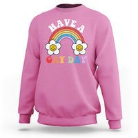 Rose pink pride sweatshirt with rainbow and “HAVE A GAY DAY” graphic