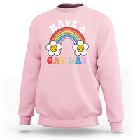 Pink pride sweatshirt with rainbow and “HAVE A GAY DAY” graphic on front