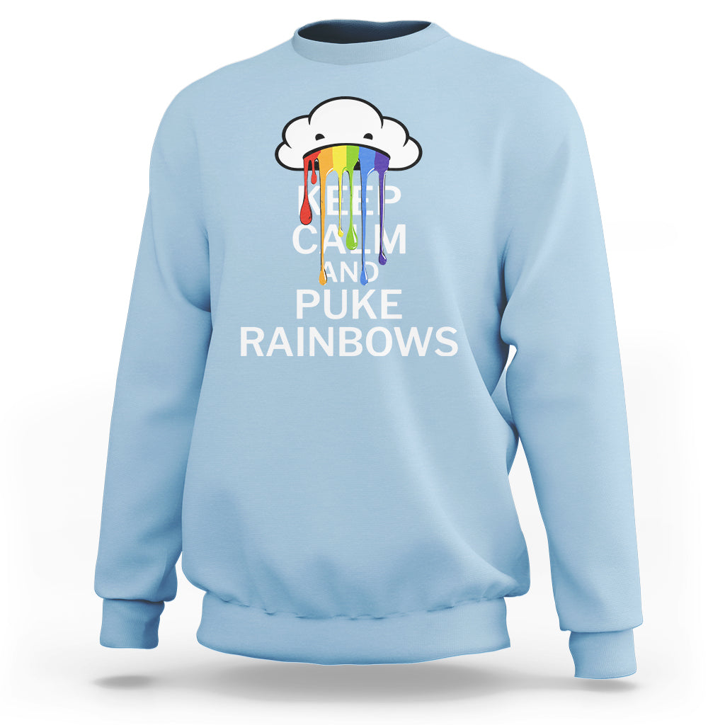 Light blue crewneck sweatshirt with rainbow cloud 'KEEP CALM AND PUKE RAINBOWS' print.