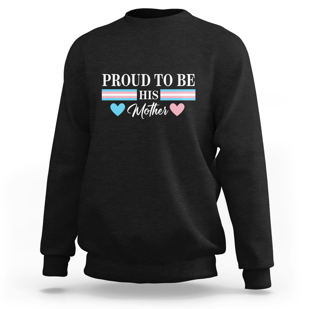 Black crewneck sweatshirt with “PROUD TO BE HIS Mother” rainbow-heart graphic on back.