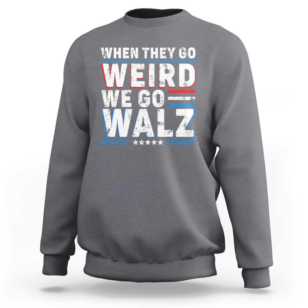 Charcoal gray crewneck sweatshirt with bold 'WHEN THEY GO WEIRD WE GO WALZ' graphic