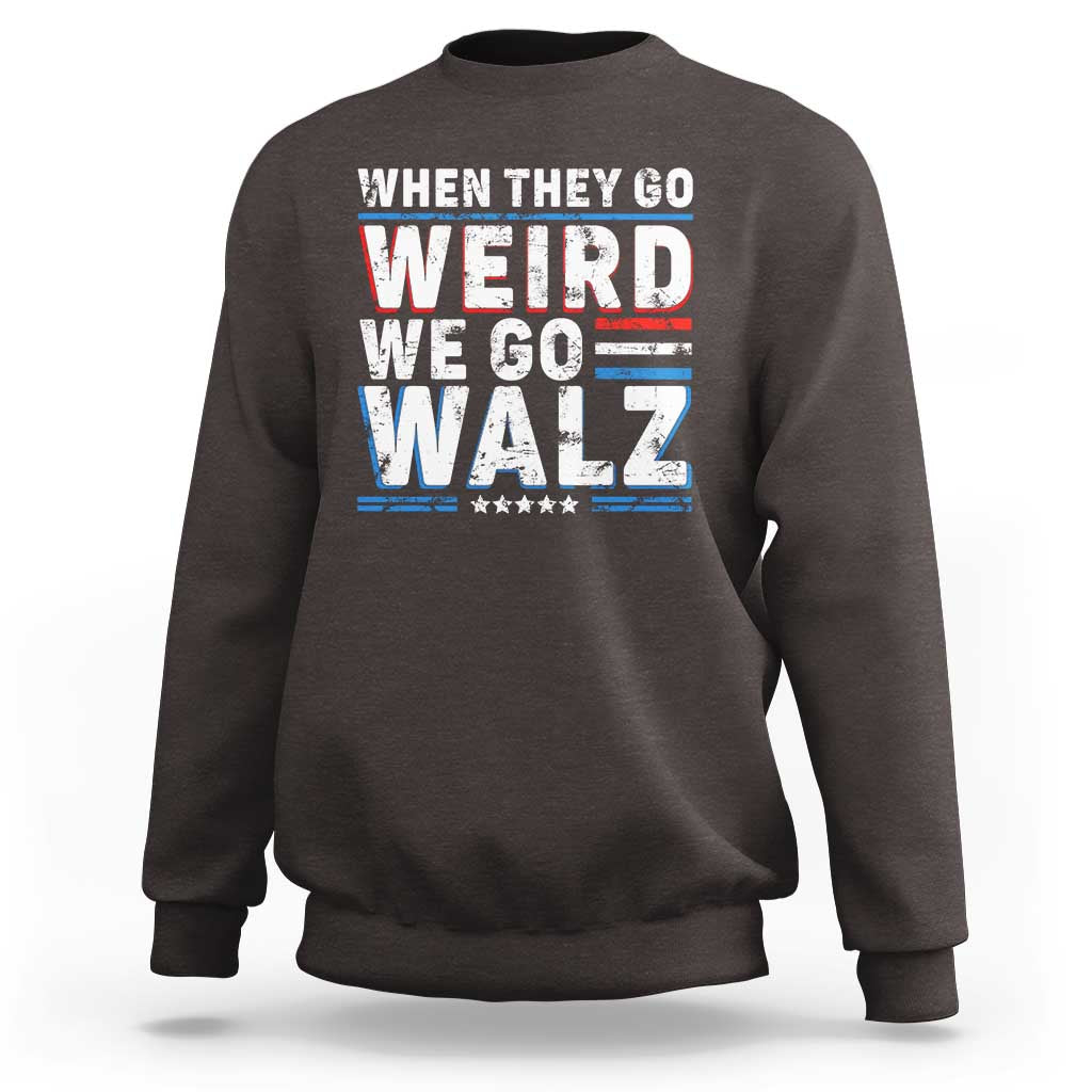 Dark brown crewneck sweatshirt with bold 'WHEN THEY GO WEIRD WE GO WALZ' graphic