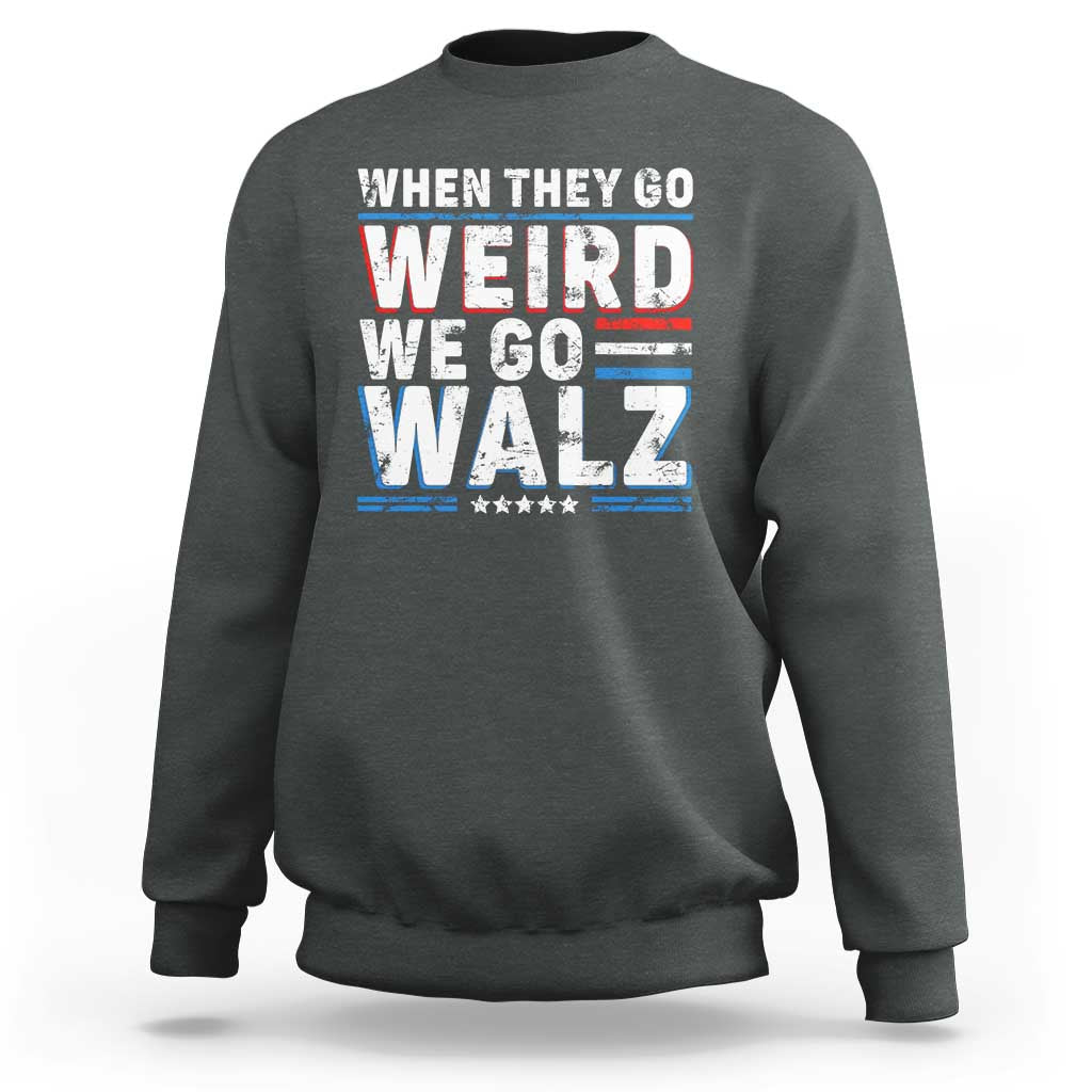 Dark gray crewneck sweatshirt with bold 'WHEN THEY GO WEIRD WE GO WALZ' graphic