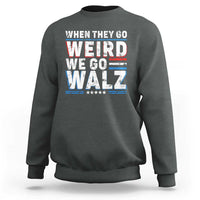 Dark gray crewneck sweatshirt with bold 'WHEN THEY GO WEIRD WE GO WALZ' graphic